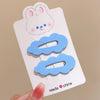 A pair of blue cloud clips (independent card packaging)