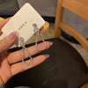 Silver figure 8 diamond chain stud earrings