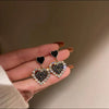 Diamond heart stud earrings
