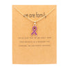 Gold card with purple ribbon