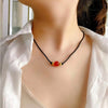 Gold bead onyx necklace