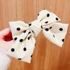 Milky white polka dots