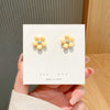 83# yellow five-petal flower