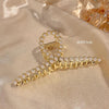 01 large gold cross pearl barrette