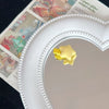 Yellow star hairpin