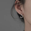 Pair of silver stud earrings