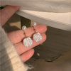 Pearl white rose stud earrings