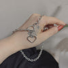Metal cutout heart necklace