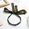 F8# knotted streamer black yellow flower