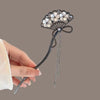 Black scalloped hairpin