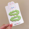 A pair of clouds with green clips (independent card packaging)