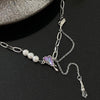Purple diamond diagonal heart necklace