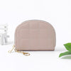 Pale pinkish gray