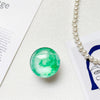 Crystal glass stand - round - smudged green / transparent bracket