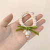 Thick lily of the valley hair tie