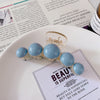 5 blue beads
