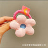 Pink cotton-filled flower hair rope