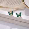 Gold butterfly stud earrings