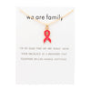 White card with red ribbon
