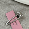 Silver hollow duckbill - diamond bow