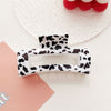 Medium square grab - cow pattern / plastic