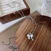 Titanium steel bow necklace