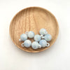 Hanging hole beads - smudged luminous - light blue