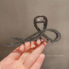 L24 black slanted bow tie