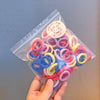 About 100 colored bags