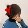 2# red plush grab clip.