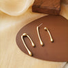 A pair of s925 silver needle gold stud earrings