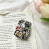 Metal stand - crinkled colored stones - silver