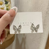 A pair of s925 silver needle butterfly earrings