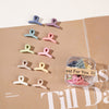 10 square boxes of cross clips