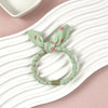 1 green dotted rabbit ears hair band