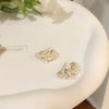 A pair of s925 silver needle flower earrings