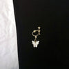 Single white butterfly ear clip