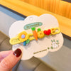 Yellow flower letter hairpin