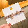 Medium brown crystal knotted hair tie