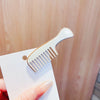 Off-white comb