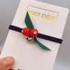 Red beads + gold diamonds