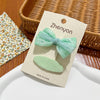 Lace bow + oval plaid