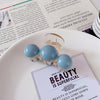 3 blue beads