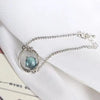 Silver planet bracelet