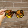 Black frame gold mercury