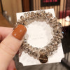 Gray crystal hang tag