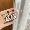 Black and white contrasting color stud earrings