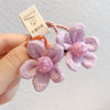 1915 pair of purple flowers