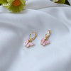 Single pink butterfly ear clip