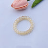 Transparent telephone cord hair tie - light orange